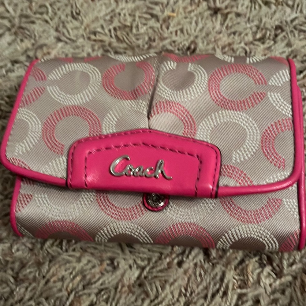 Coach. Never used.